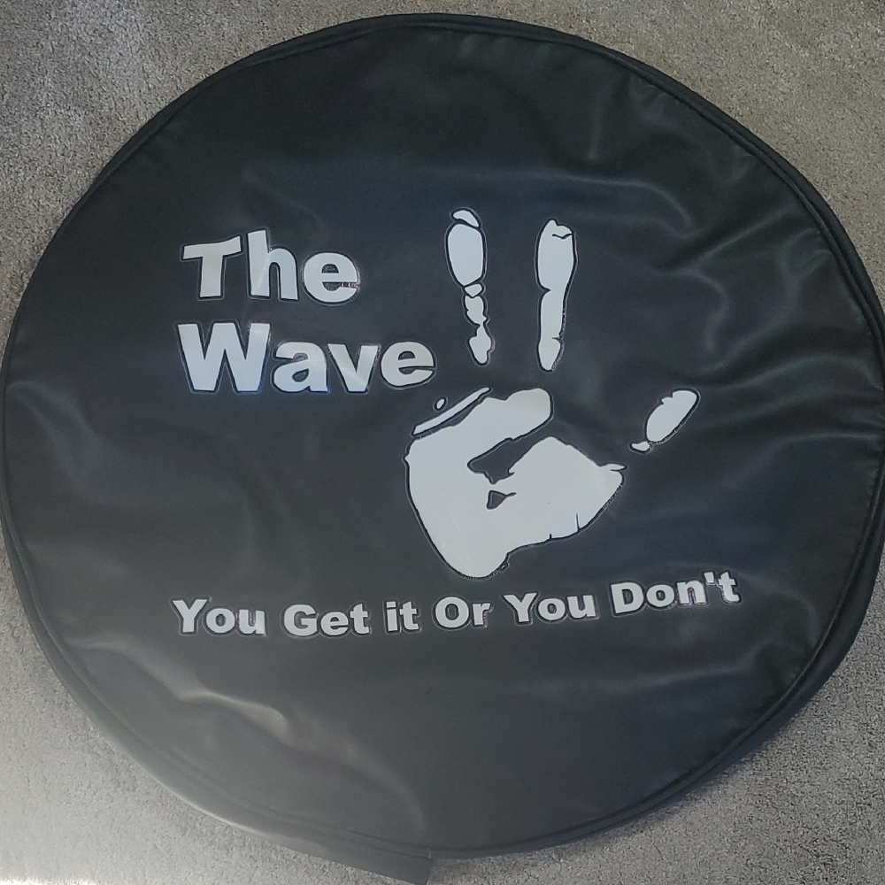 The Wave Black Spare Tire Cover.              Size 32 Inches